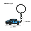 A blue Ford Bronco zinc alloy keychain with a black split ring and chain.