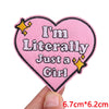 Pink heart shaped embroidered patch with text I'm Literally Just a Girl and gold stars