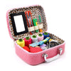 A pink zippered pouch containing a heavy duty leather sewing kit with needles and thread.