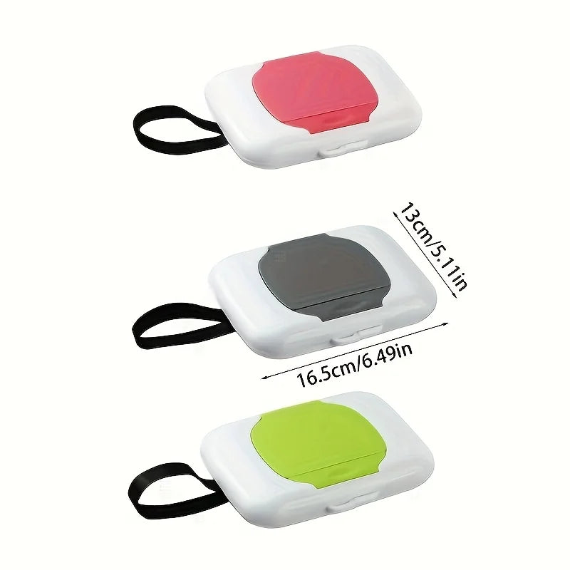 Three refillable wipe dispenser boxes in pink, gray, and lime green colors shown from above.