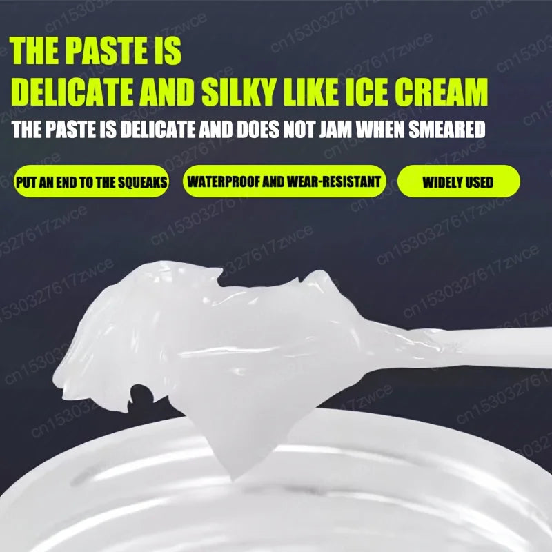 A white paste is shown being smeared onto a surface, highlighting its delicate and silky texture.