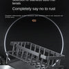A black stainless steel sink organizer rack with a drainage tray shown on a dark surface.