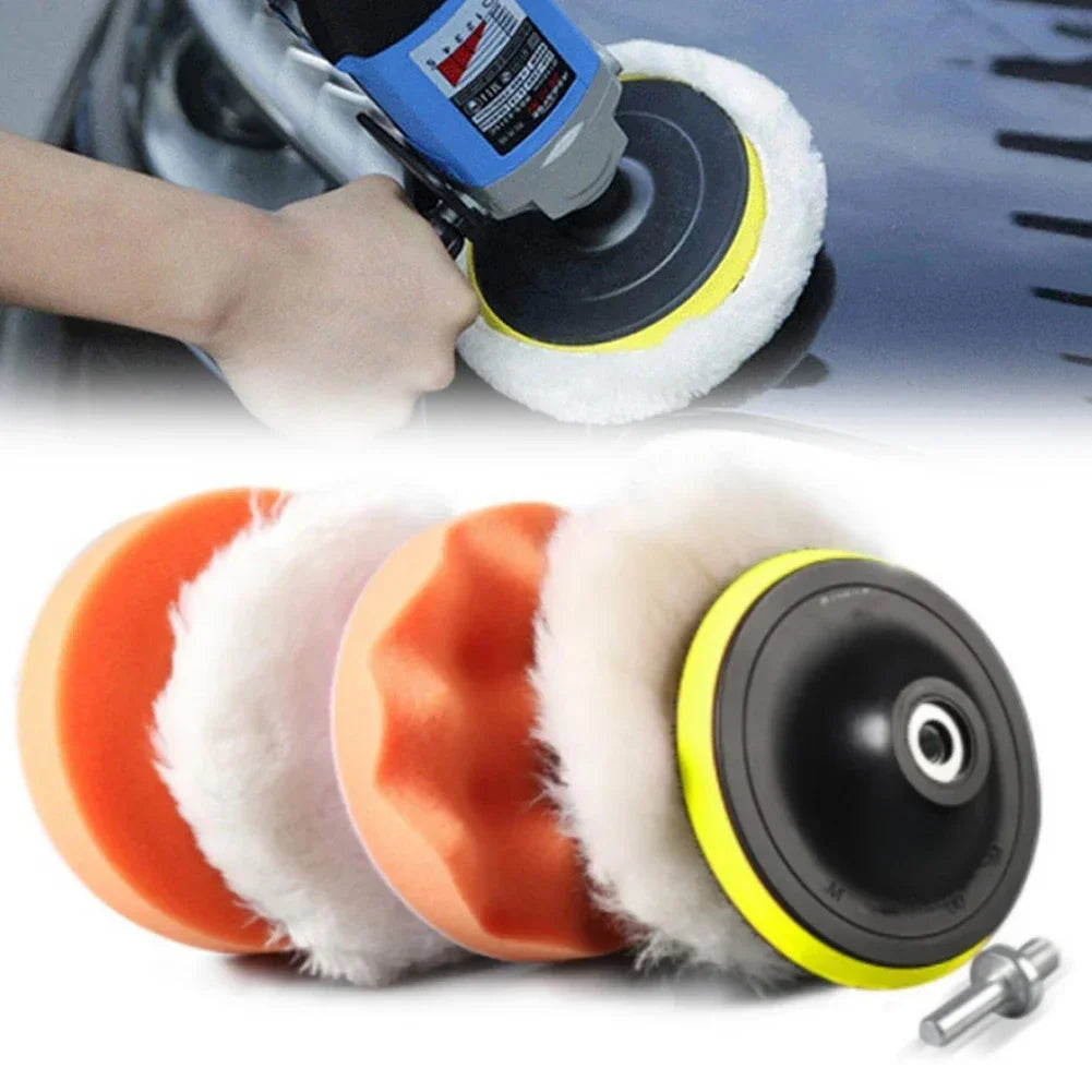 A set of six orange and white car polishing pads with a drill adapter for automotive detailing.