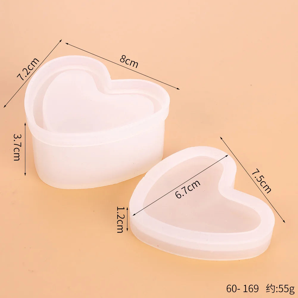 A set of clear silicone jewelry boxes, including a main container and a lid, shown with dimensions.