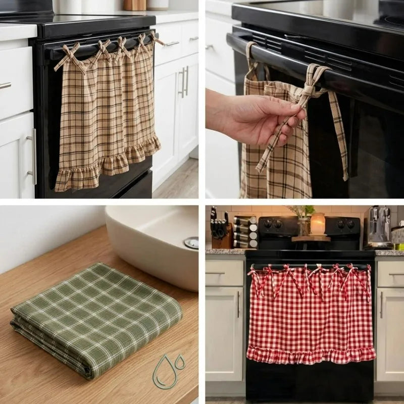 A plaid oven skirt with ruffled trim is shown being pulled out of a black oven, alongside a folded green plaid kitchen towel.