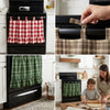 A close-up of a black oven featuring a plaid fabric skirt with a ruffled trim.