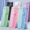 A collection of colorful A4 mini paper trimmers or cutters displayed in various shades including green, pink, white, and blue