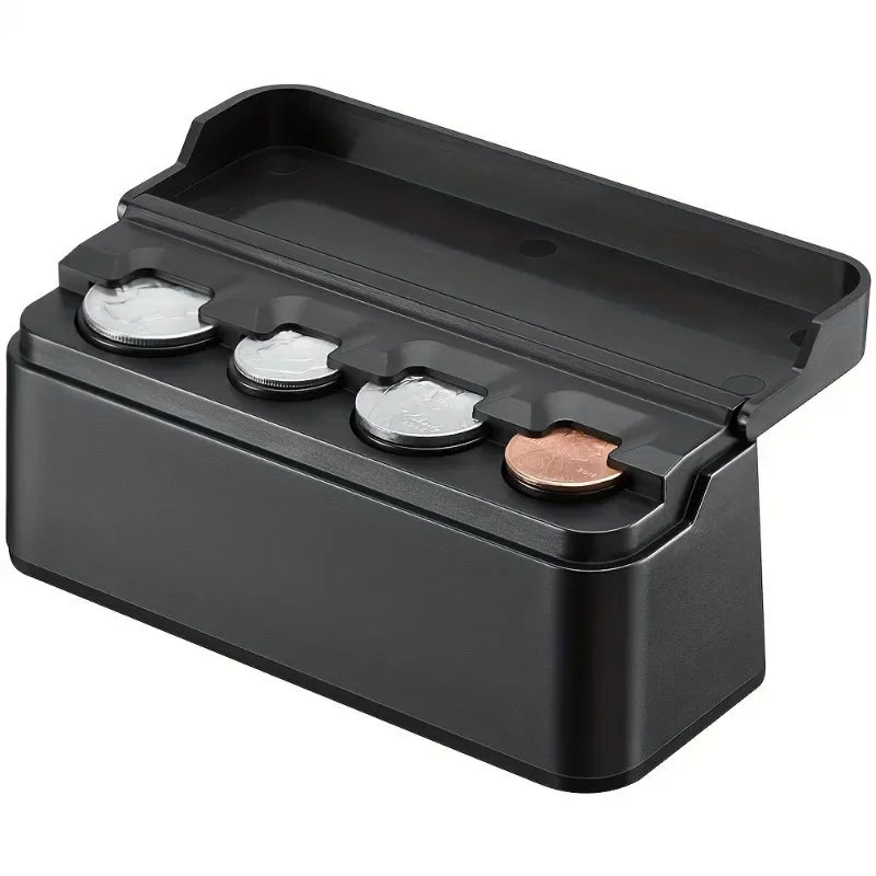 A black car coin storage box with four slots for organizing coins and small items.