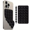 A silver smartphone case with a black silicone suction cup mount and an accompanying black mounting strip.