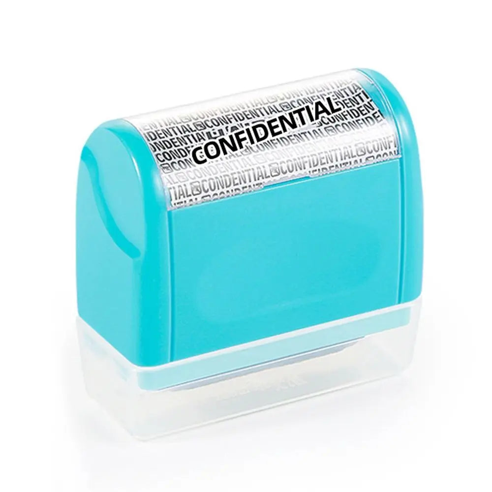 A small, light blue plastic stamp with text on it is shown against a white background.