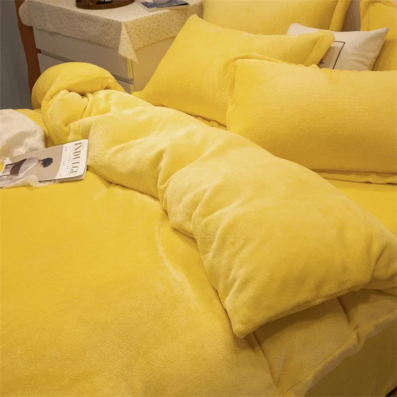 A bright yellow cozy flannel duvet cover with a zipper is displayed on a bed.