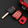 A red key fob and a protective TPU cover are shown on a black surface.