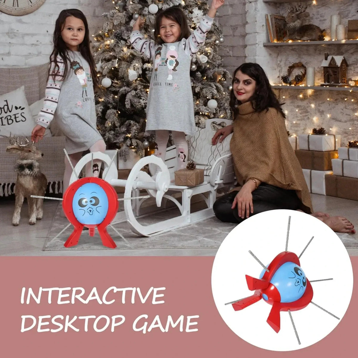 A family strategy game featuring a red balloon burst component and decorative elements in a festive setting.