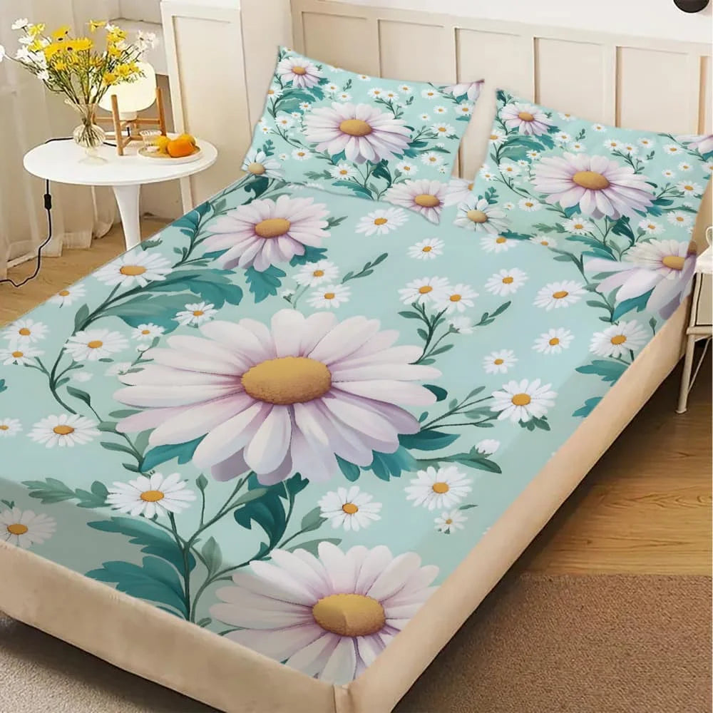 A fitted sheet featuring a light blue background with white and pink daisy floral print on a bed.