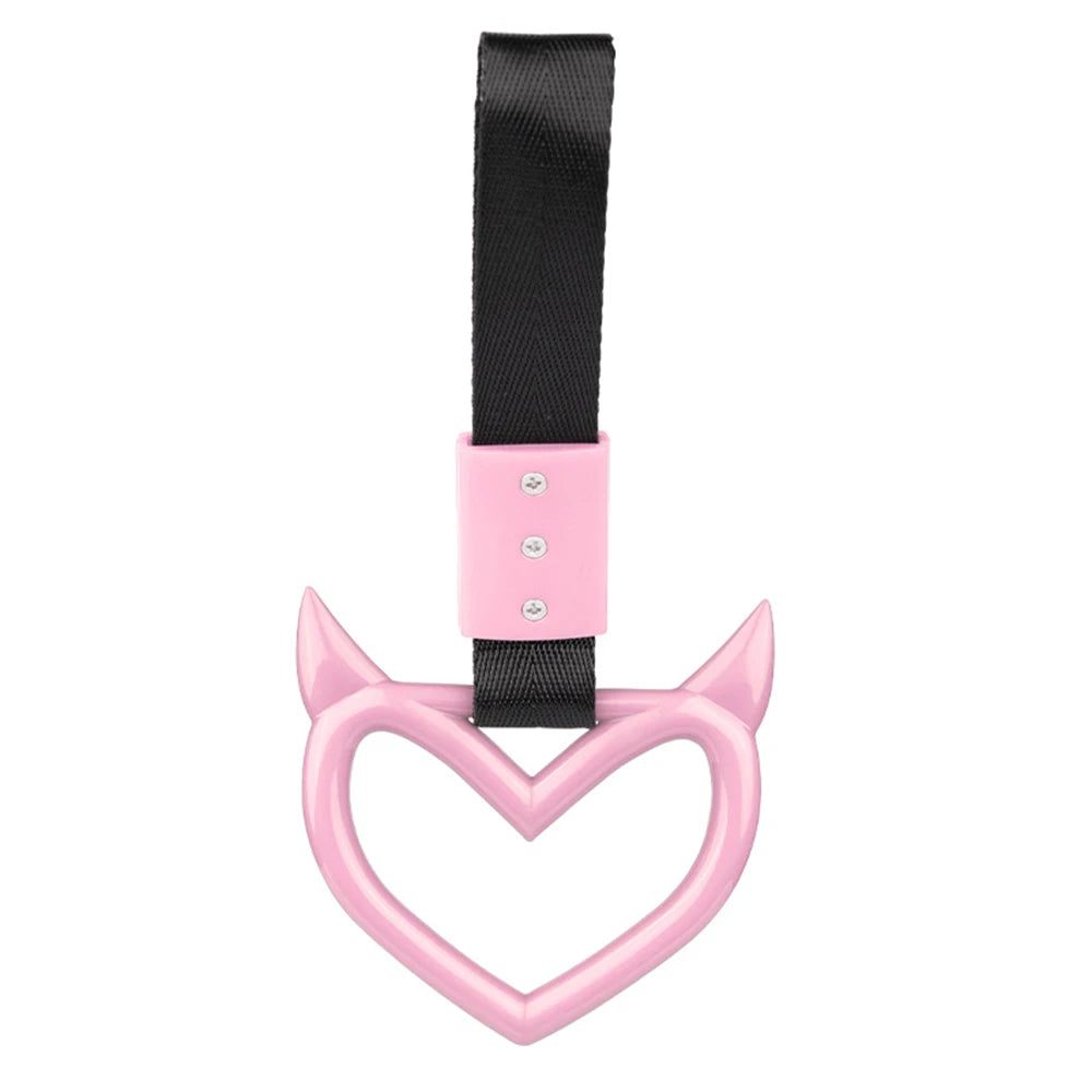 Pink heart-shaped ring drift handle with a black strap