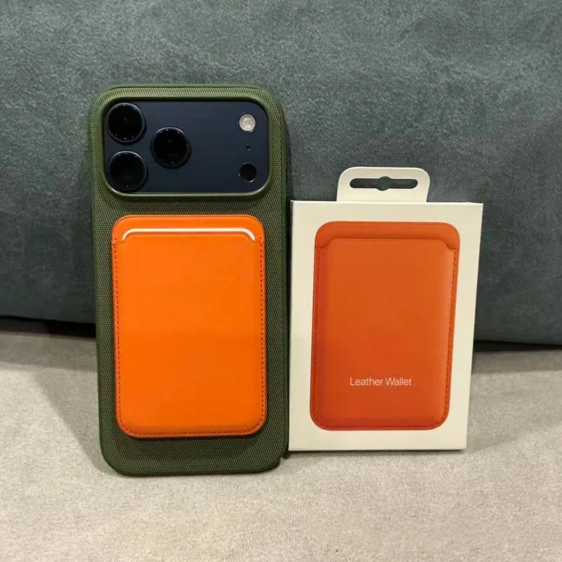A green phone case with an orange magnetic wallet insert displayed next to the product box.