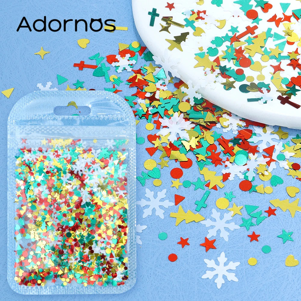 A clear plastic container filled with colorful star sequins is shown next to a white surface covered in scattered confetti.