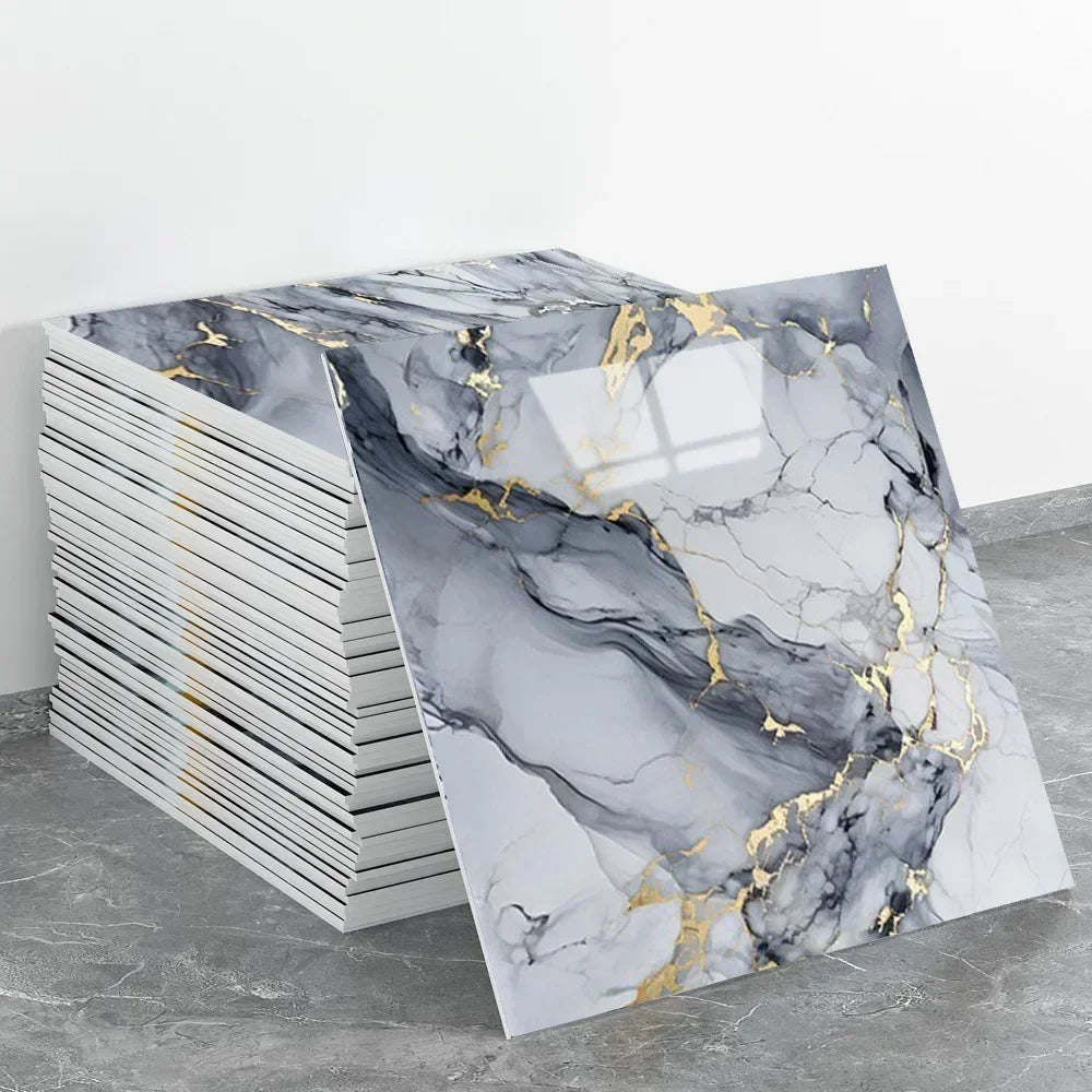 A stack of rectangular marble effect wall stickers featuring gray and black marble with gold veining.
