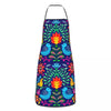 A vibrant Mexican floral art apron featuring colorful leaves and birds in shades of blue, green, and red.
