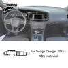 Carbon fiber interior trim kit for Dodge Charger featuring a steering wheel and dashboard components