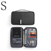 A black waterproof family passport and document organizer wallet with a hinged cover.