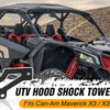 UTV hood shock tower light bracket for Can-Am Maverick X3 models shown in a desert environment