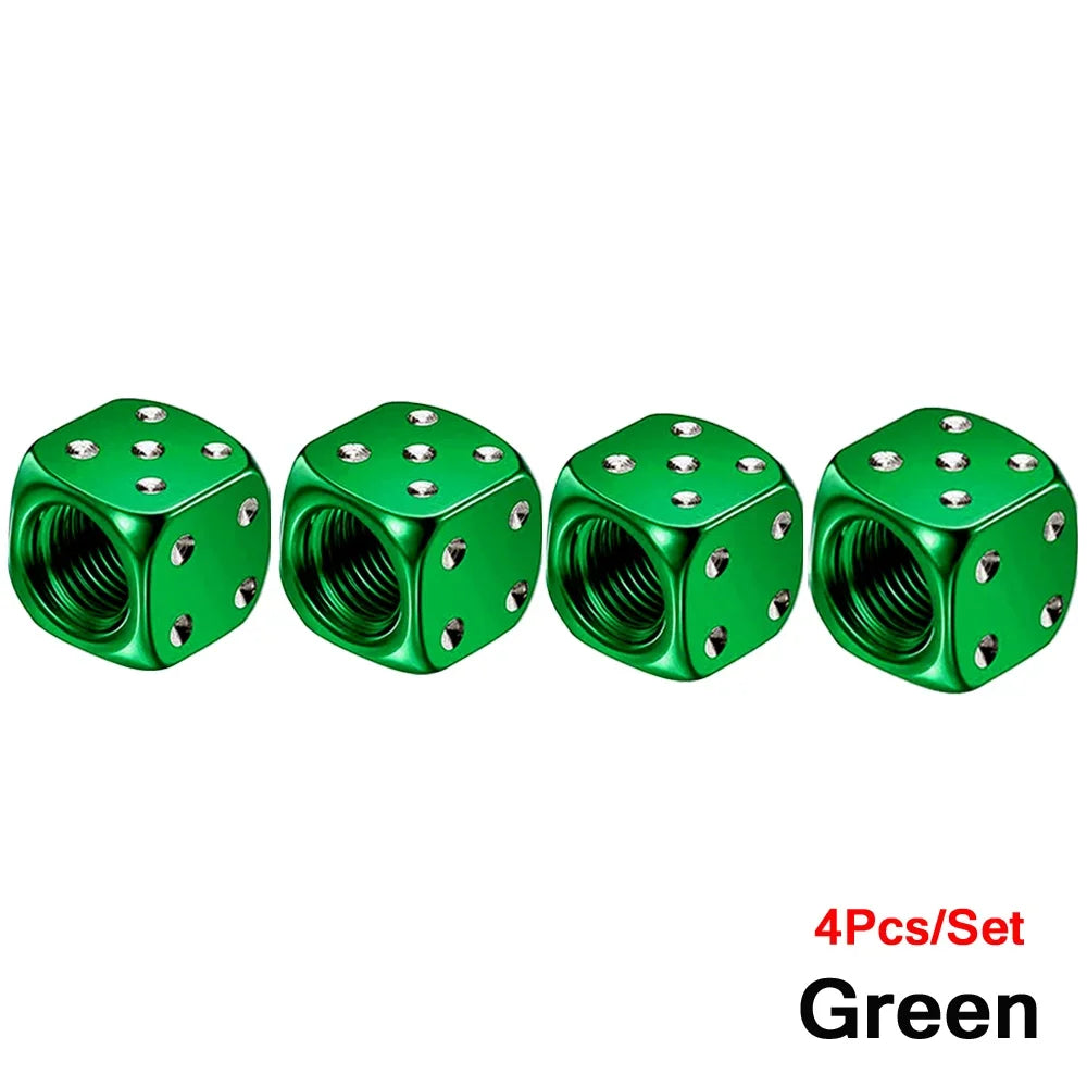 A set of four green aluminum alloy dice design tire valve caps.