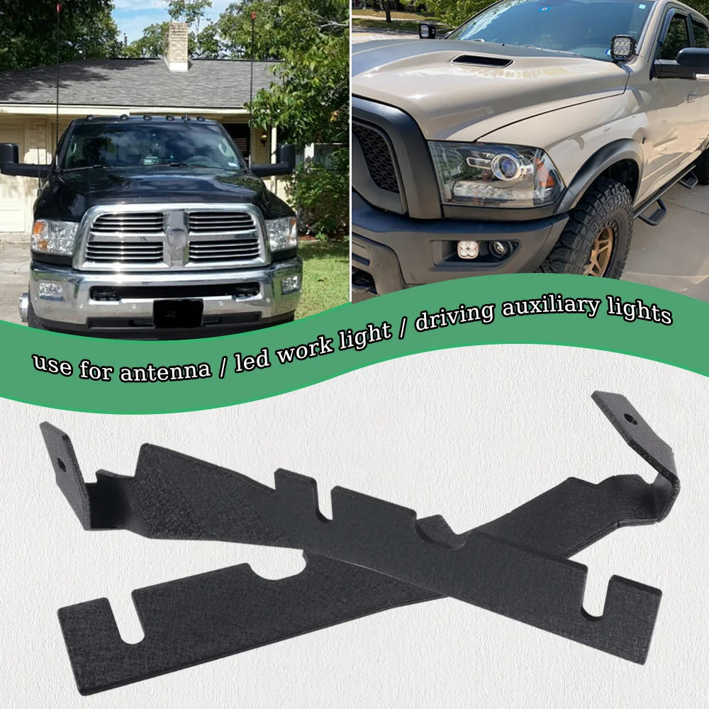 Black LED work light and driving auxiliary lights mounting brackets for a Dodge Ram hood antenna.