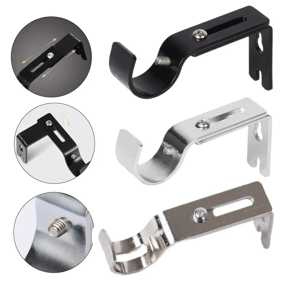 A set of black and silver metal curtain rod brackets for 1-inch rods shown in various angles.