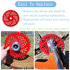 A close-up view of a red 36-tooth carbide tipped brush cutter blade being installed onto a lawn mower.