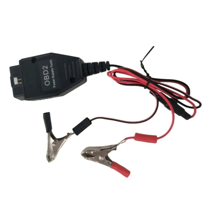 An OBD2 battery memory saver device with a digital display and attached wires.