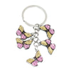 Silver keychain charm featuring a colorful butterfly design with pink and yellow wings