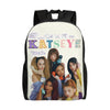 A canvas daypack backpack featuring a colorful design with various faces and text.