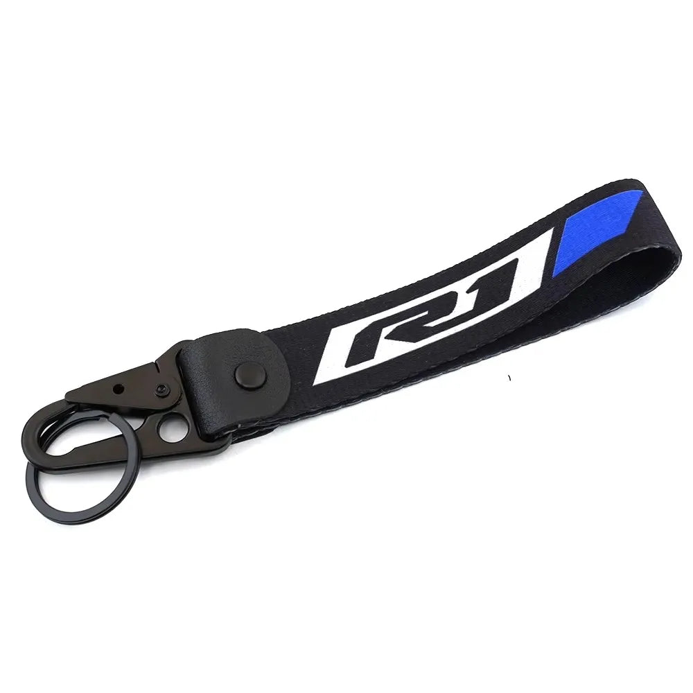 Black and blue brake fluid reservoir cover sock for Yamaha R1 R6 motorcycle.