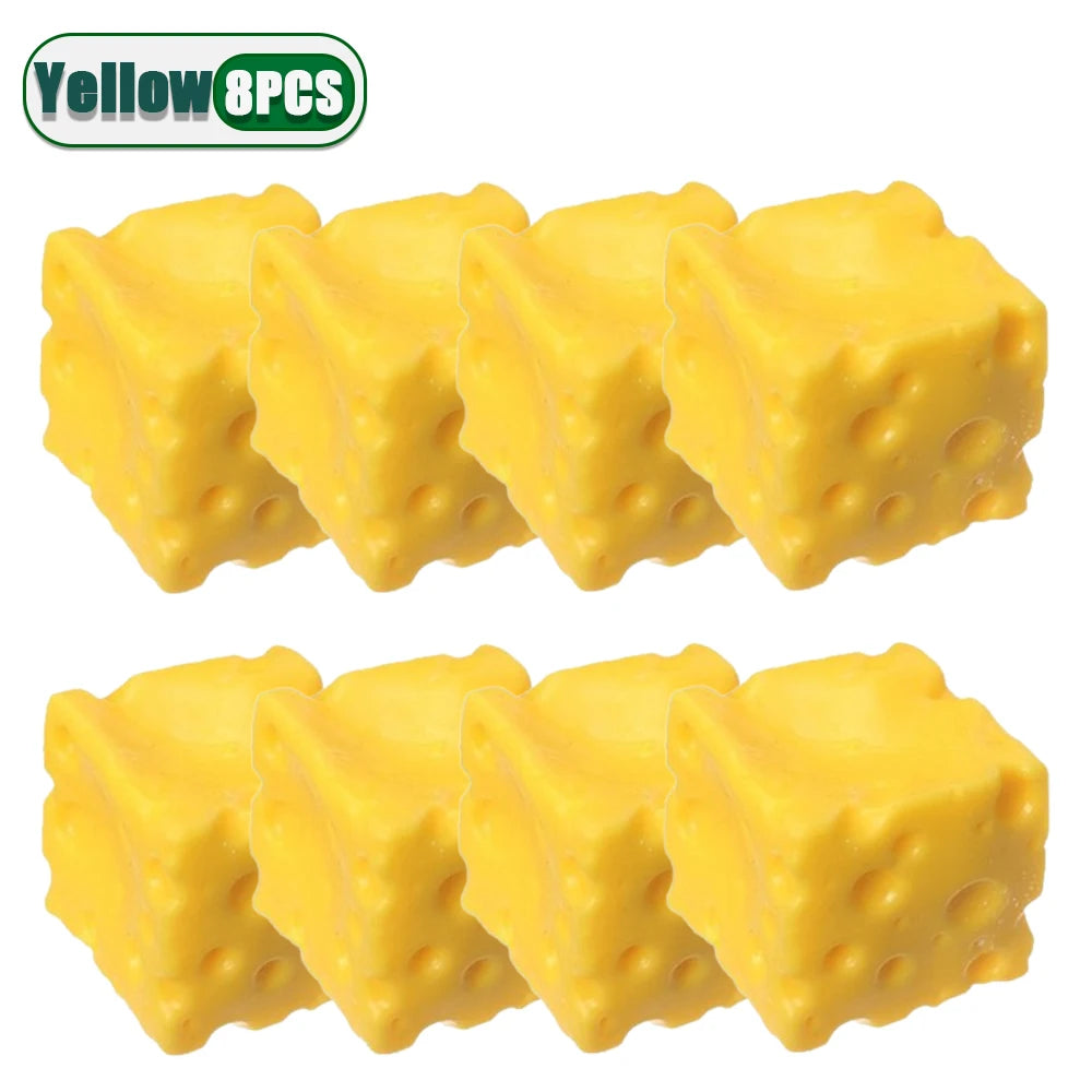 Eight yellow squishy stress relief toys shaped like cheese cubes