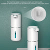 A white touchless automatic soap dispenser is mounted on a wall, shown next to a close-up view of the product.