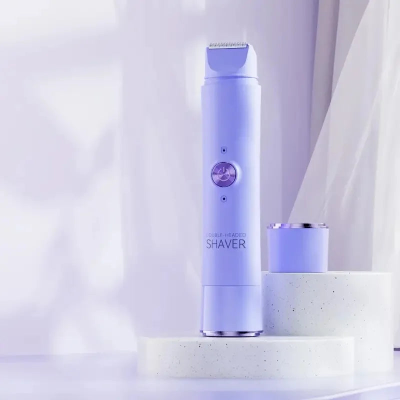 A tall purple electric shaver standing on a white cylindrical stand next to a white round platform.