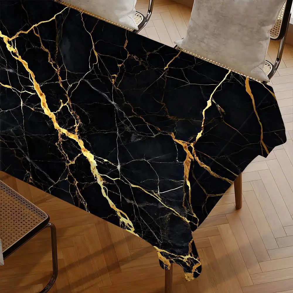 Black gold marble waterproof tablecloth featuring intricate gold veining on a dark fabric.