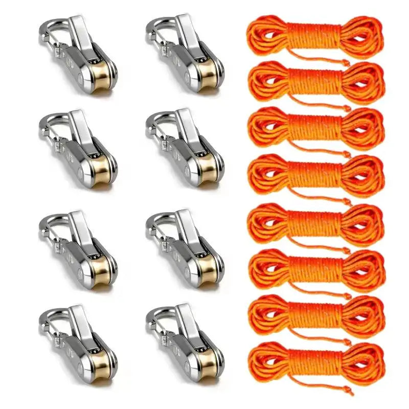 A set of aluminum alloy tent rope tensioners with reflective orange cords.