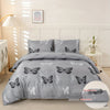 Gray butterfly print duvet cover set with pillowcases displayed on a bed.