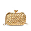 A gold woven clutch bag with a textured pattern and a detachable chain strap.