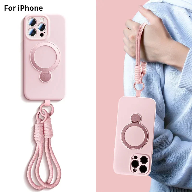 A pink silicone case for iPhone featuring a magnetic ring design and a lanyard attached.