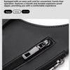 Close-up of a black zippered pocket on a wallet bag showing a silver zipper pull.