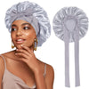 A woman models a satin sleeping bonnet and adjustable tie, showing the product's texture and fit.