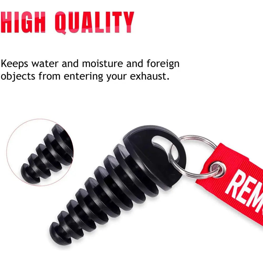 Black rubber exhaust wash plug with a keychain tag for motorcycles and dirt bikes