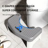 A gray C-shaped groove design storage shelf for toilets shown in a bathroom setting.