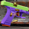 A purple and green toy pistol with a mechanical one-key shell throwing feature is shown against a textured background.