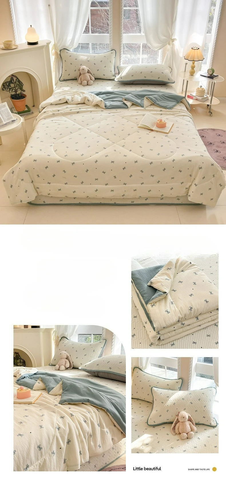A light beige quilt with a subtle blue cartoon pattern featuring small animals, displayed on a bed.
