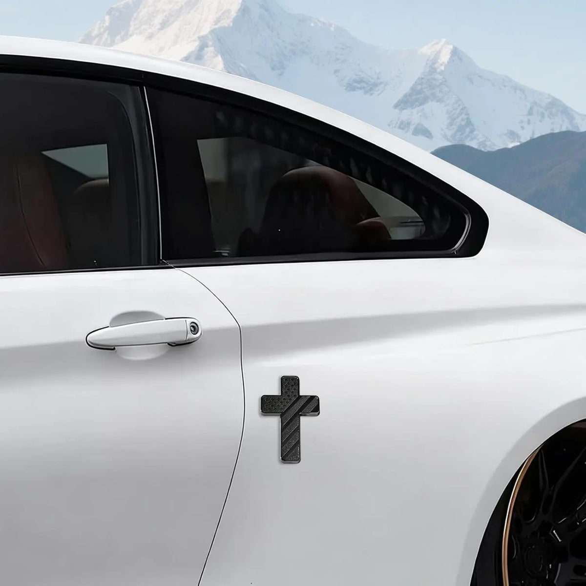 A white car door features a black cross emblem on the side panel.