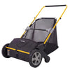 A black push lawn sweeper with a yellow handle and large hopper is shown from the side.